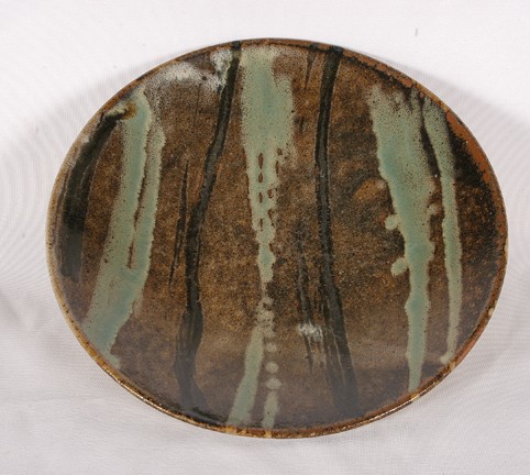 Shoji Hamada (attributed). Bamboo Plate.: Fired studio pottery with glaze. Bamboo stripes motif. Mint condition. 11diameter. Provenance: Howard Campbell. Est. $1,000-2,000. Ship: $35"