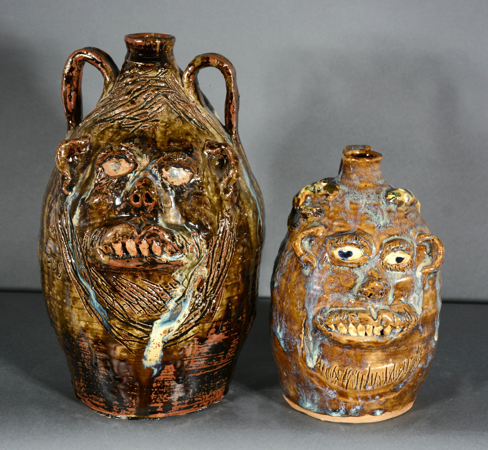 Marie Rogers. Face Jugs with Snakes and Lizard. (1 of 2)