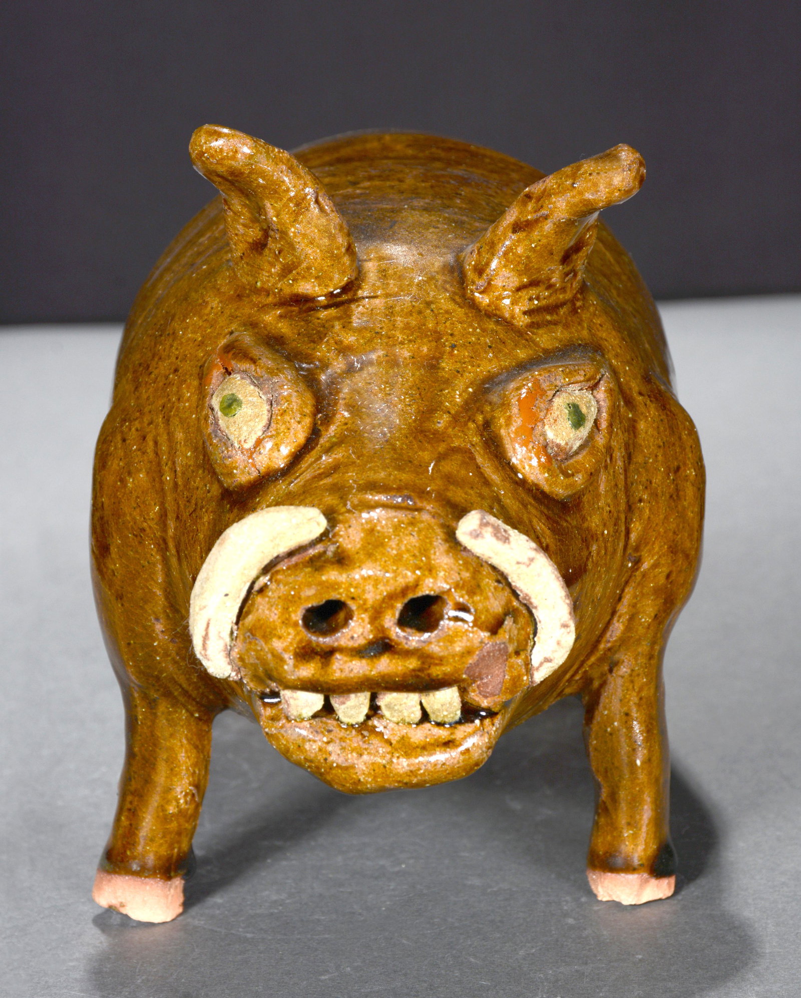 Reggie Meaders. Boar.: Reggie Meaders. Boar. Signed. Repair to left tusk, otherwise good condition. 7"h x 12" long. Est. $100-200. Ship: $55