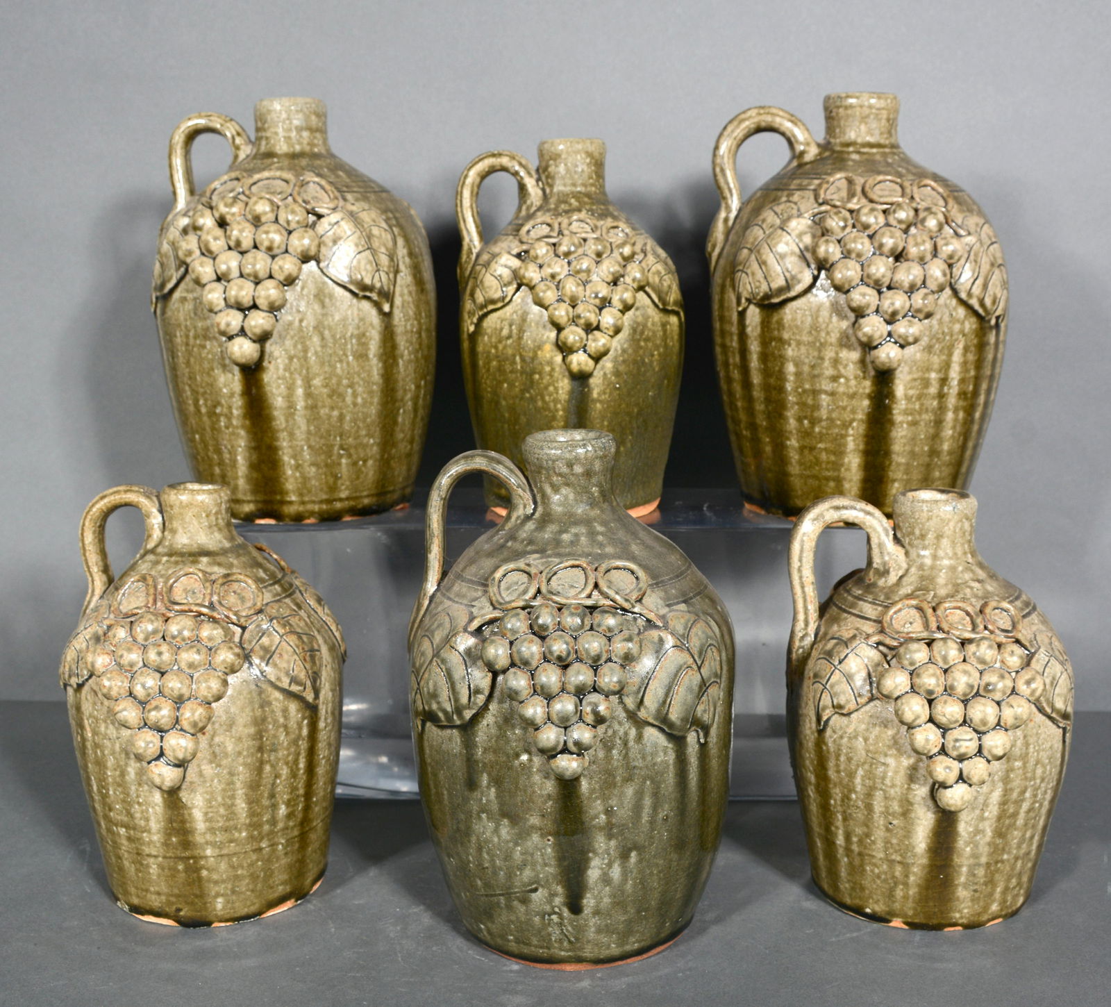 John Meaders. Six Grape Decorated Whiskey Jugs. (1 of 4)