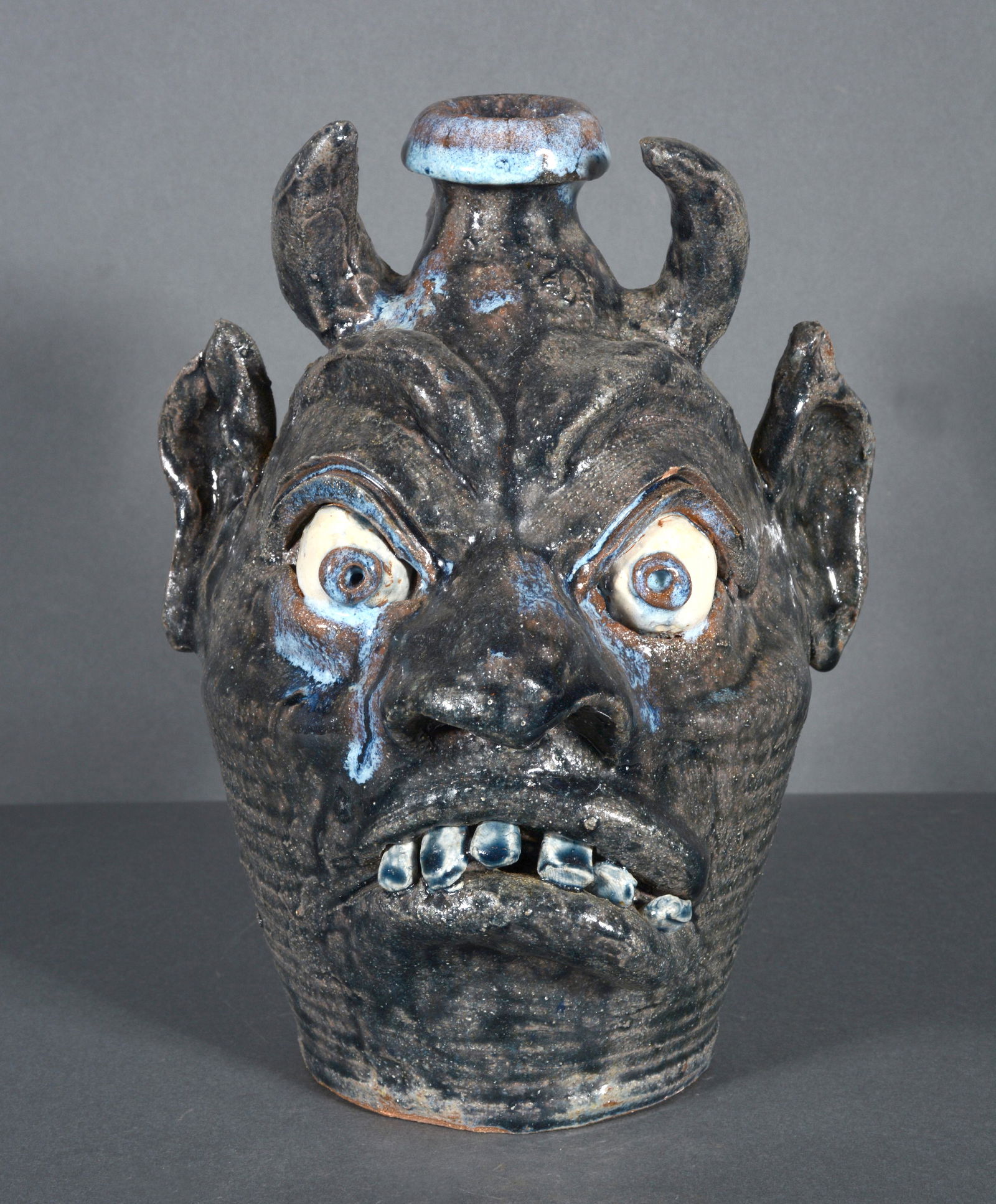 William Flowers. Devil Face Jug With Thick Glaze. (1 of 3)