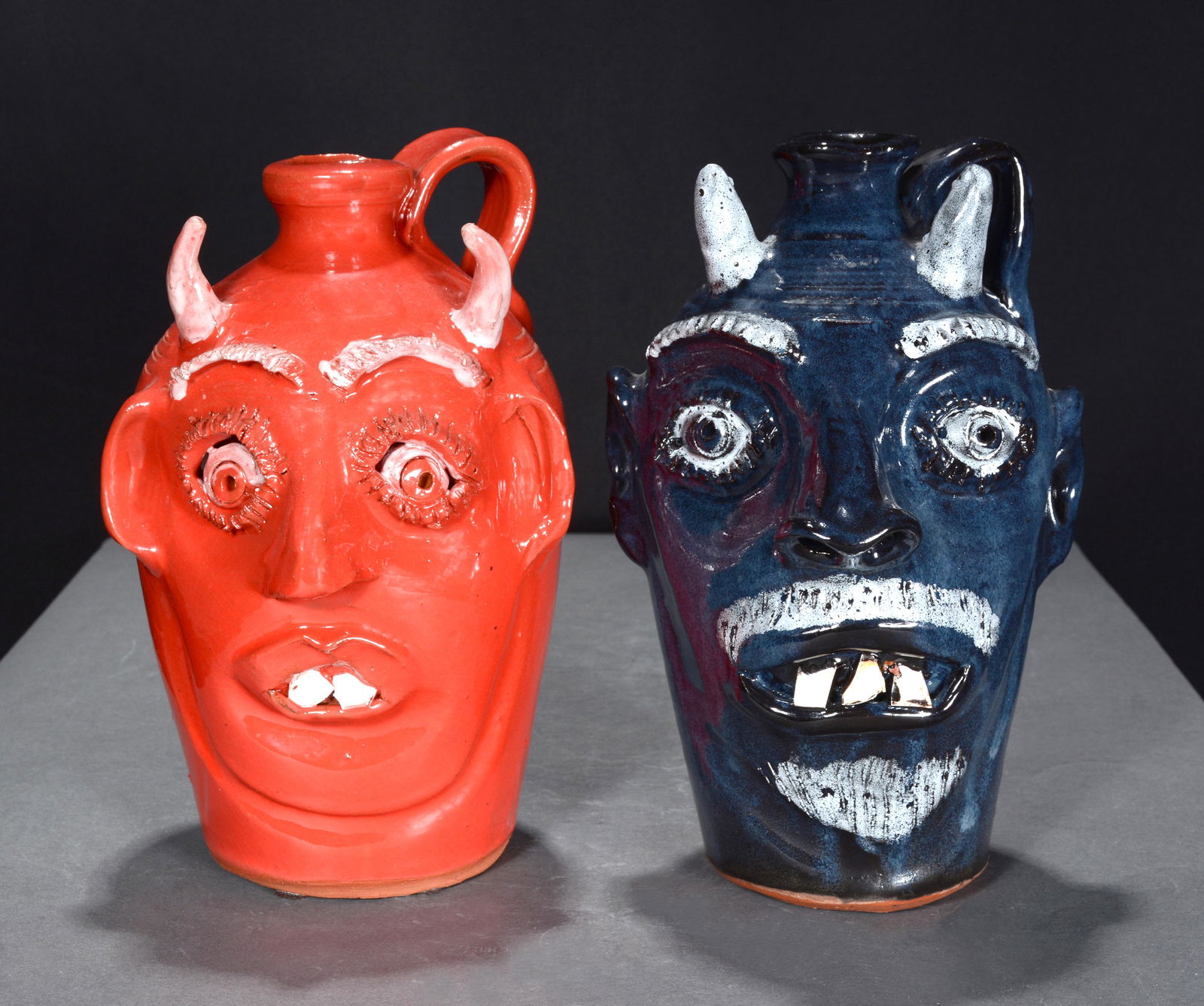 Bobby Ferguson. Blue & Red Devil Face Jugs. (1 of 4)