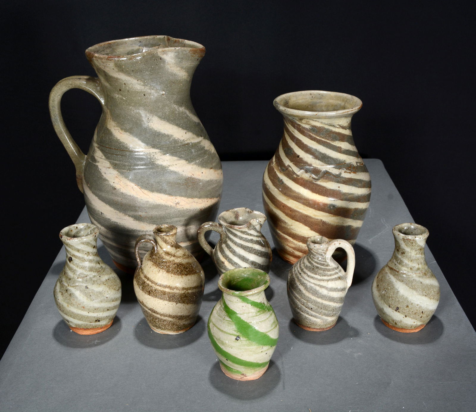 B.B. Craig. 8 Swirl Pitchers, Vases and Minis. (1 of 2)