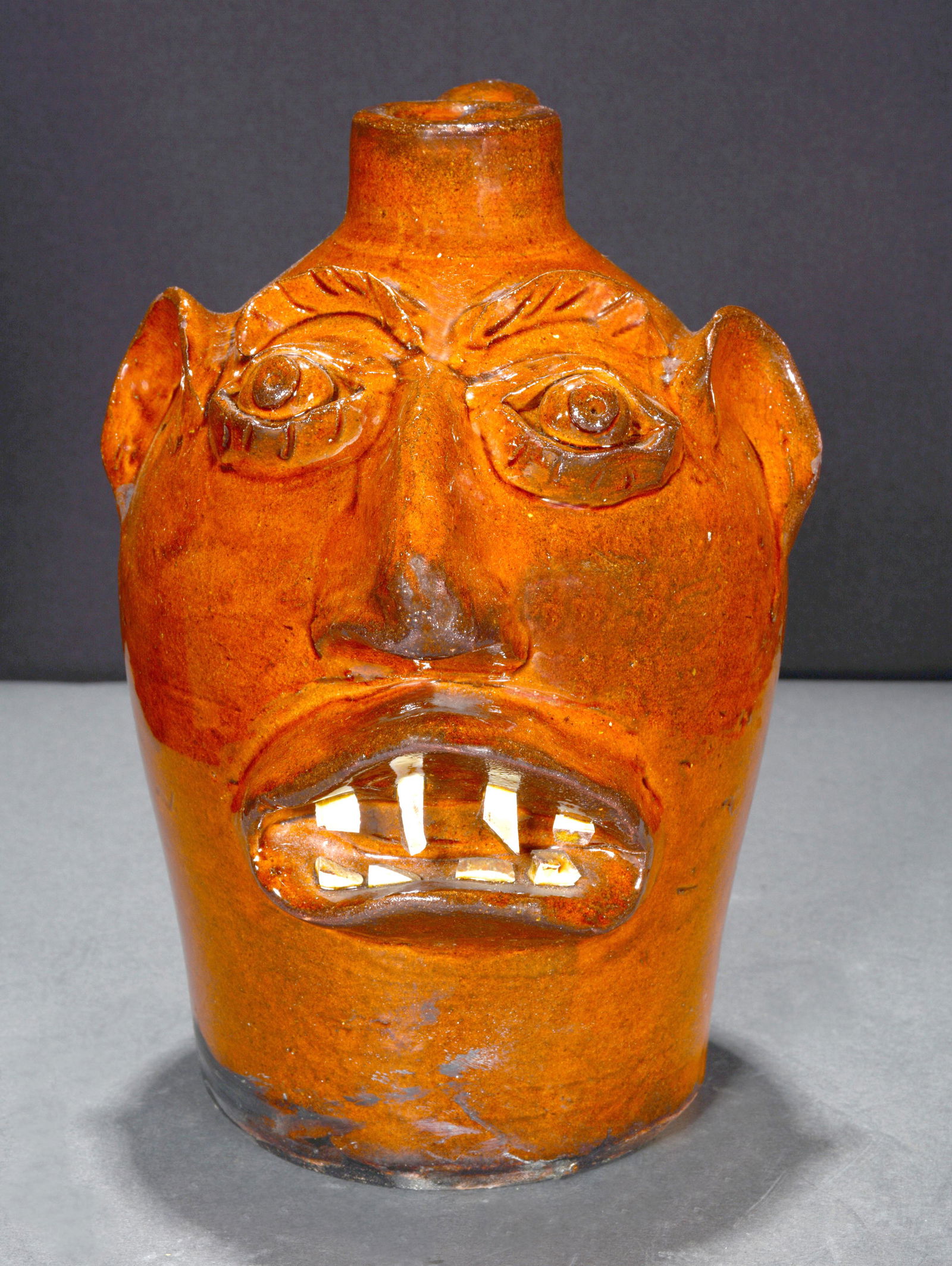 Brown Family. Face Jug With Traditional Glaze. (1 of 6)