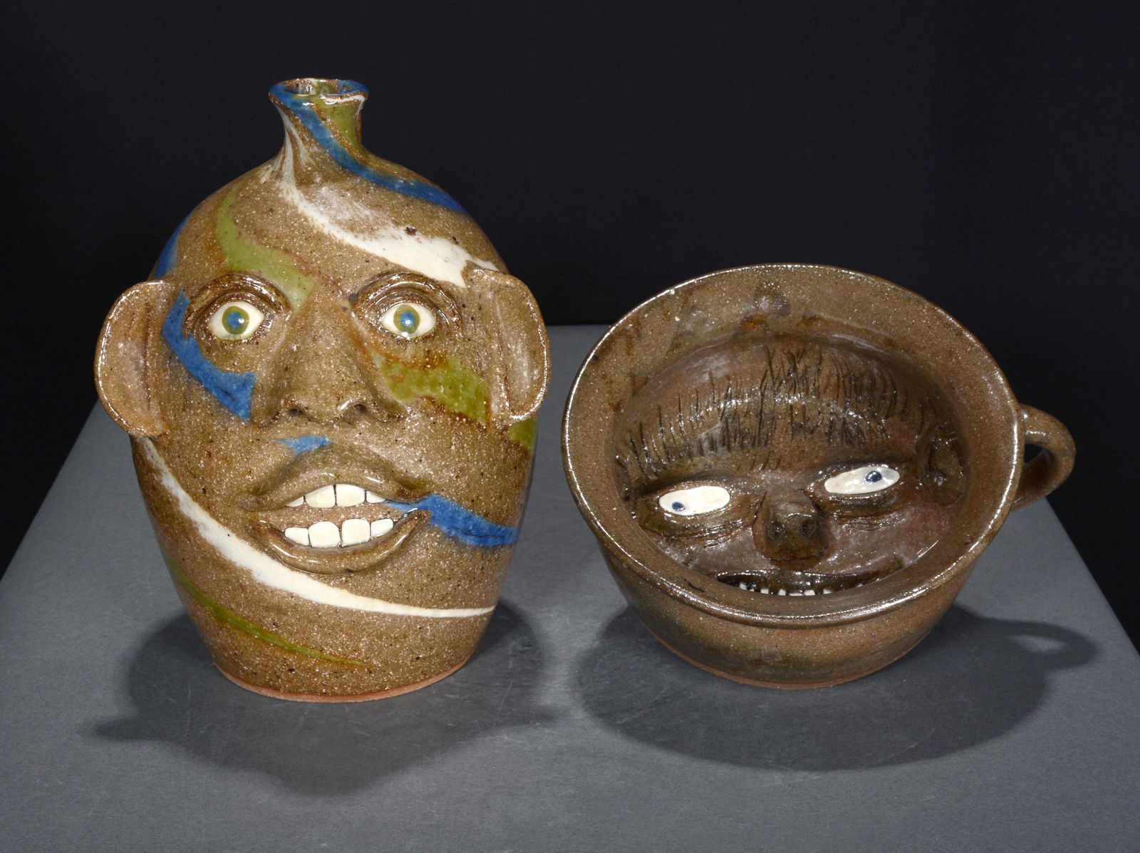Joe Reinhardt. Swirl Face Jug & Chamber Face Pot. (1 of 2)