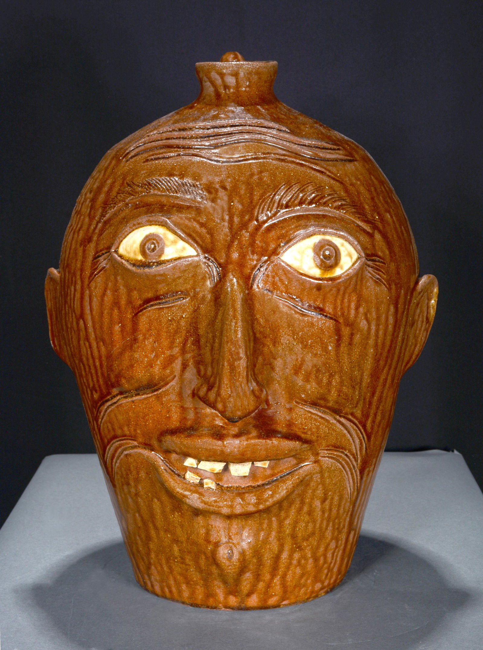 Charlie West. Large 4 Gallon Face Jug. (1 of 3)