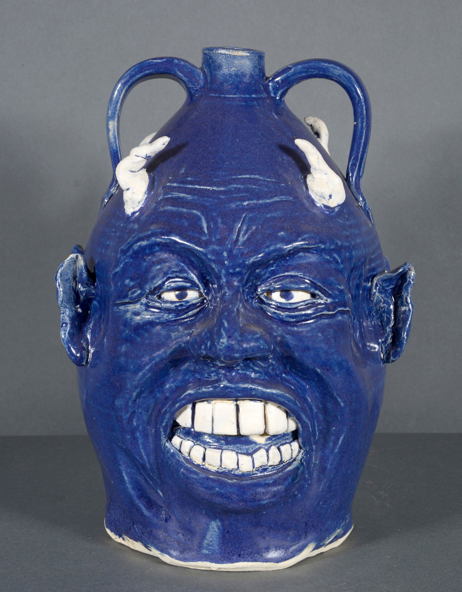 K. Haney. Double Face Blue Devil Jug. (1 of 4)
