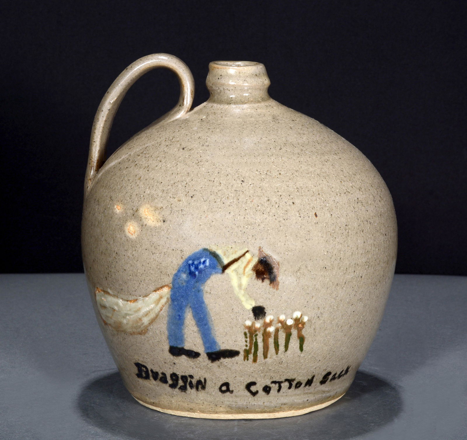 Wilford Dean. Dragging A Cotton Sack. (1 of 2)