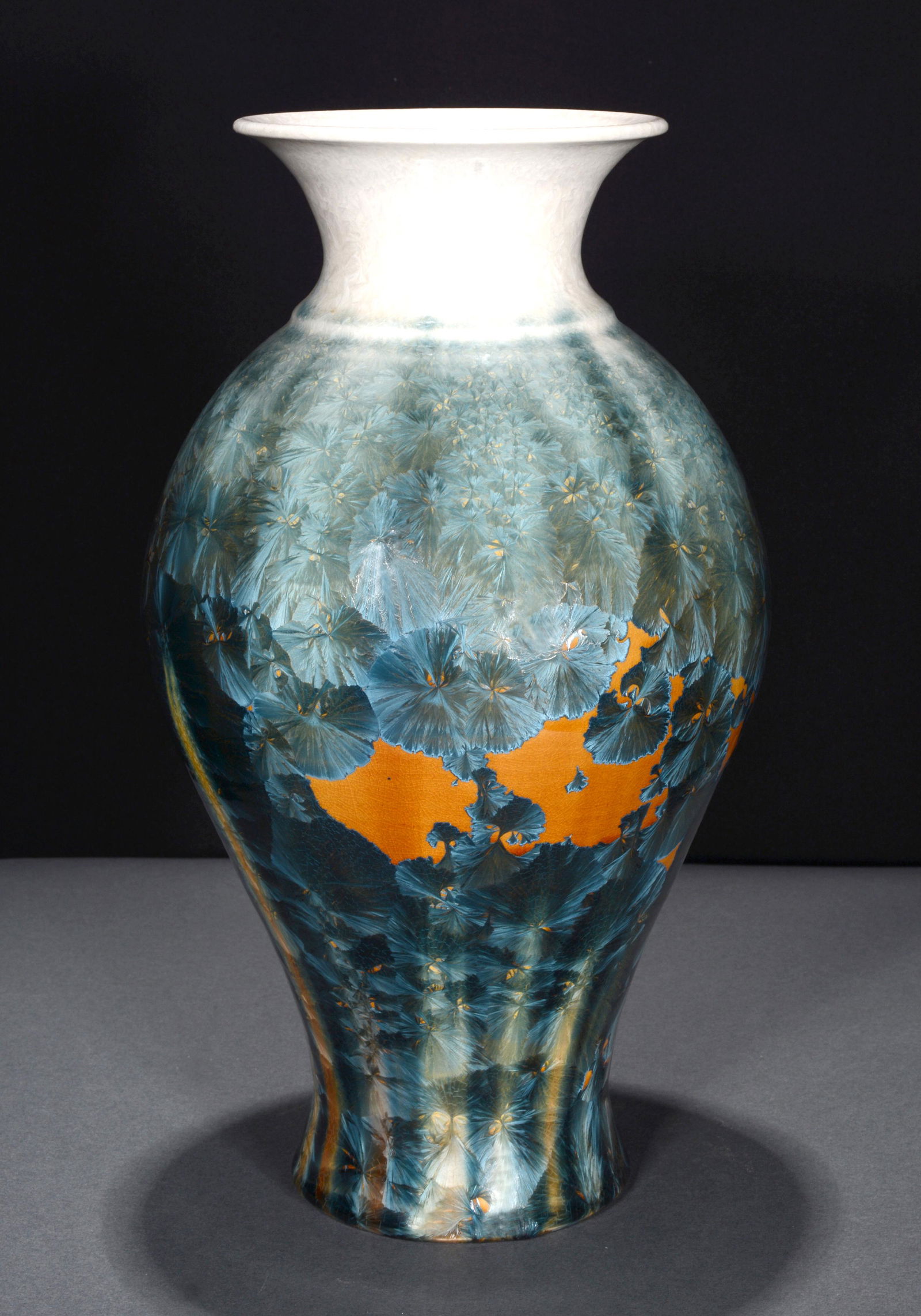 Phil Morgan. Blue Crystalline Glaze Over Orange Vase. (1 of 3)