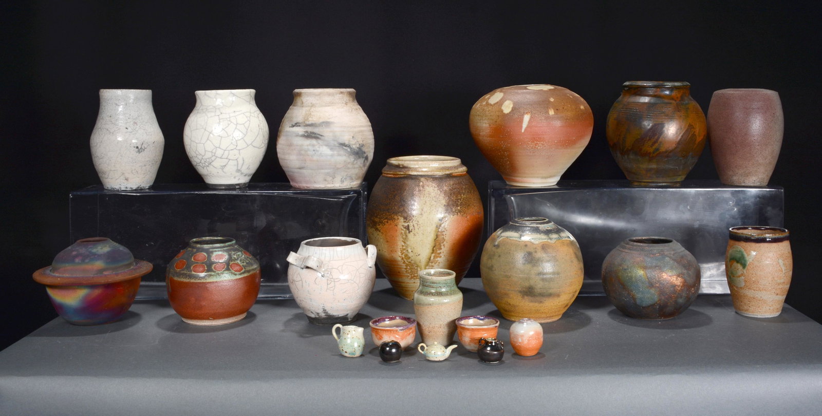 Phil Woodhall. 13 Raku & Miniature Pottery Pieces.: Phil Woodhall. 13 Raku and Miniature Pottery Pieces. All are signed. Average size is 5-6"h. Excellent condition. Est. $200-400. Ship: $200