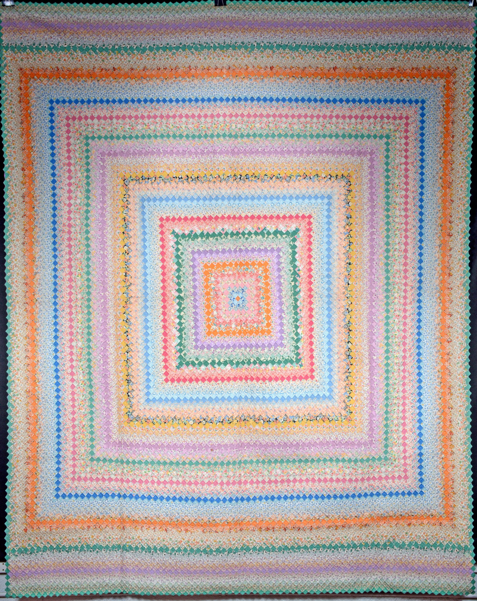 Around The World Pattern With Saw Tooth Edges Quilt.: Unknown Artist. Around The World Pattern With Saw Tooth Edges. c. 1930's. Cotton. Hand-stitched. Excellent condition. Wonderful intricate details. 79" x 99". Provenance: Barbara and Robert Hunter Coll