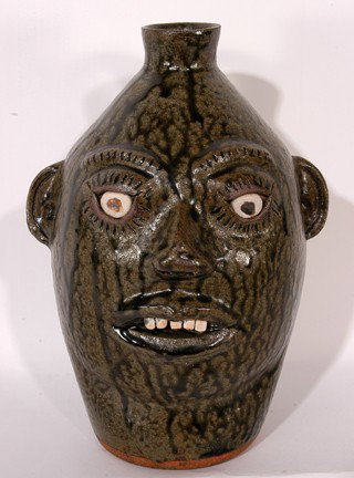 A.G. Meaders Tall Sorgum Face Jug.