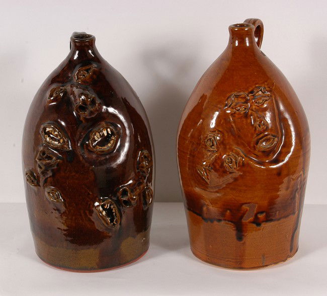 Brown Pottery Pair of Jugs.: Pair of Jugs.Two's Company, Three's a Crowd, Johanna Brown. Light-Colored Jug with Faces by Robert Brown, MT. Each jug is 14" h. Mint condition. Est. $200-300. Ship: $90