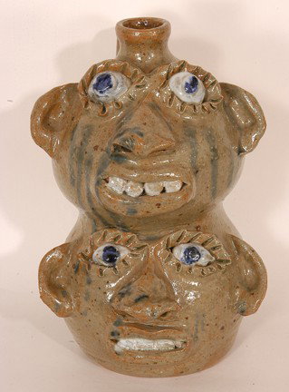 Jerry Brown Totem Face Jug.: Totem Face Jug. Nice glass drips. 11"h. Mint condition. Est. $100-200. Ship: $35