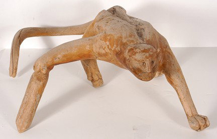Raymond Coins (attrib). Stylized Cat.: Stylized Cat. Carved root wood, varnish, metal tacs for eyes. Some environmental wear to varnish, otherwise good condition. 30" x 37" x 16" h. Est. $500-800. Buyer is responsible for shipping.