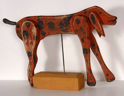 Marvin Schmitz Red Bone Coonhound.: Red Bone Coonhound. c. 1970's-80's. Carved and painted wood on display stand. Signed on base. Some wear of paint, otherwise great condition. 27" w x 20" h. Est. $300-500. Ship: $50