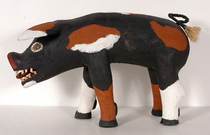 Ron Rodriquez Black & White Pig.: Black and White Pig. Carved and painted wood, marble eyes, rope tail. Signed and dated, 1996. Excellent condition. 23" long x 10" w x 14"h. Est. $500-800. Ship: $85