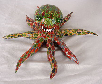 Jeff Payne Octopus.: Carved and highly painted wood. Signed and dted, 2002. Excellent condition. 6" x 18" diameter. Est. $100-300. Ship: $40