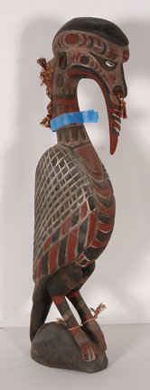 Clan Spirit Figure PNG Tribe.: Mimdimbit village, middle sepik river, New Guinea. Clan spirit totem bird, beautifully carved bird totem, kept in the clan ceremonial house. Carved with an image of a primordial ancestor for a face. 3