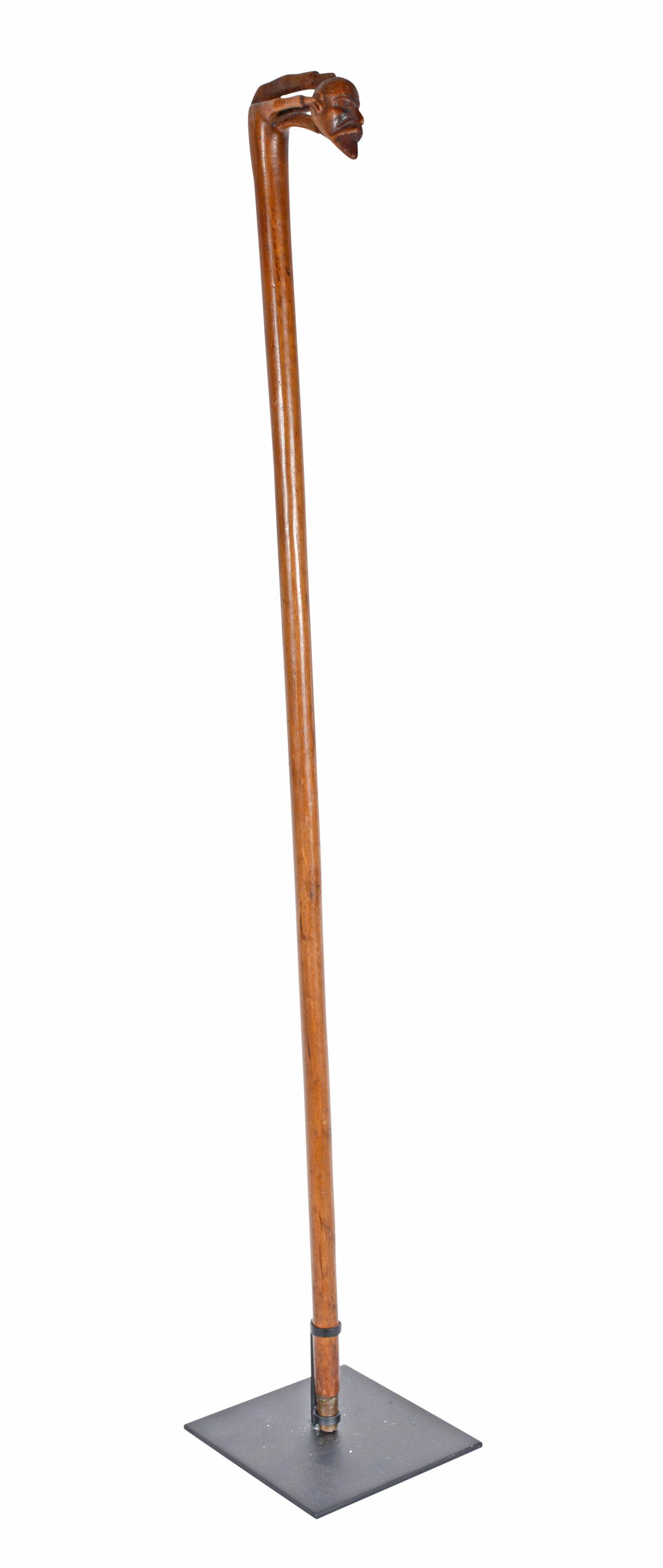 Manâ€™s Head In Claw Walking Cane. (1 of 5)