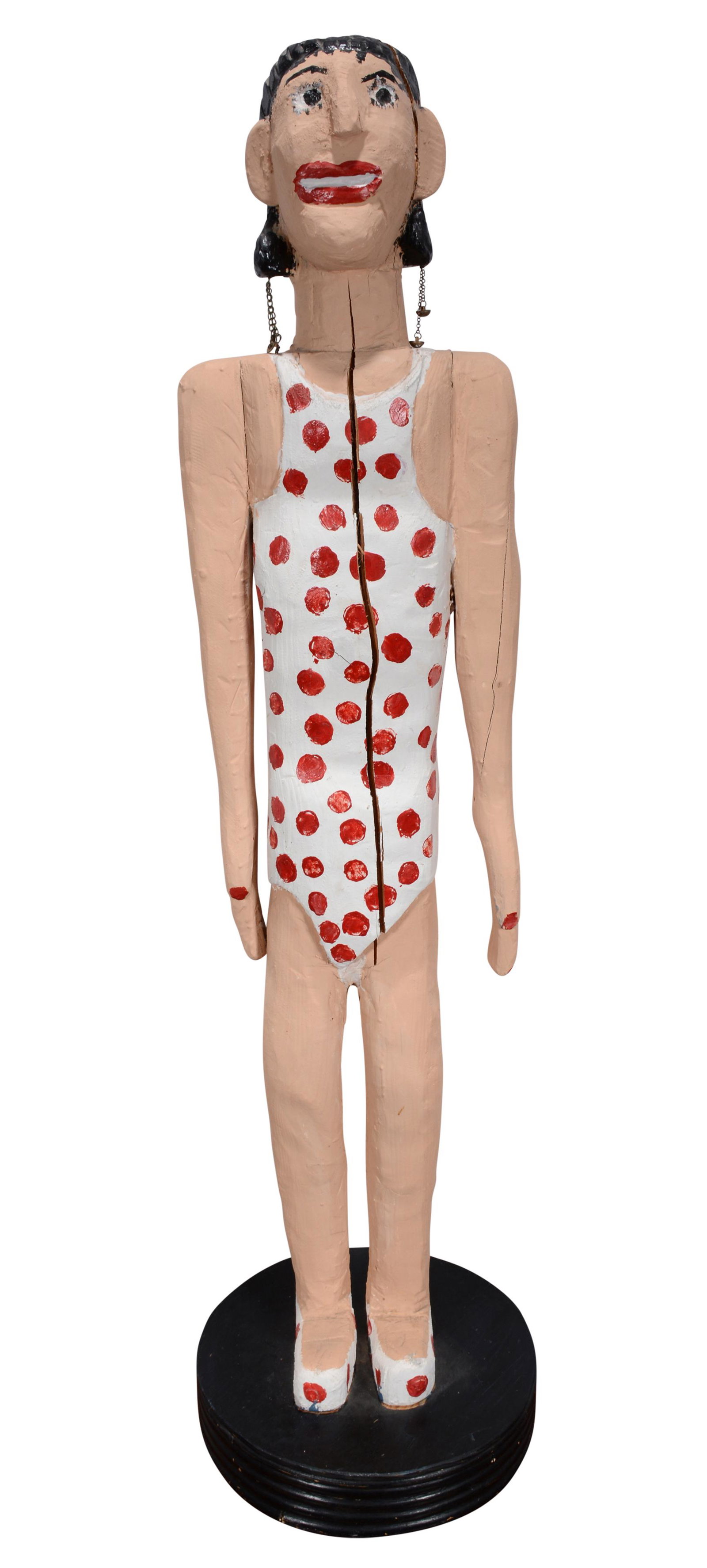 Wesley Merritt. Woman In Polka Dot Swim Suit.: Wesley Merritt. Woman In Polka Dot Swim Suit. 1991. Not signed. Carved and painted wood. Natural wood split, otherwise good condition. 65"h x 17" diameter. Est. $100-200. Buyer is responsible for ship
