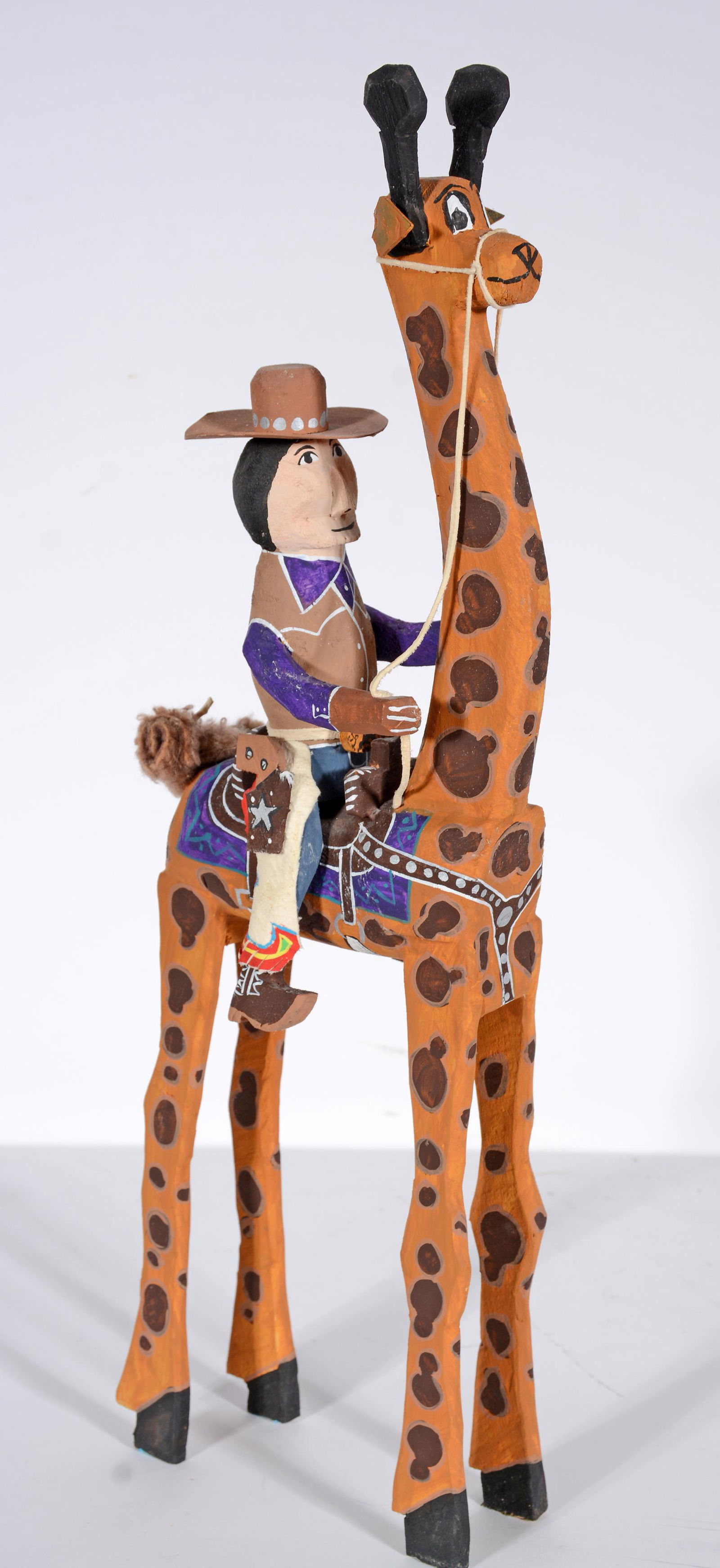 Delbert Buck. Giraffe Riding Cowboy. (1 of 3)