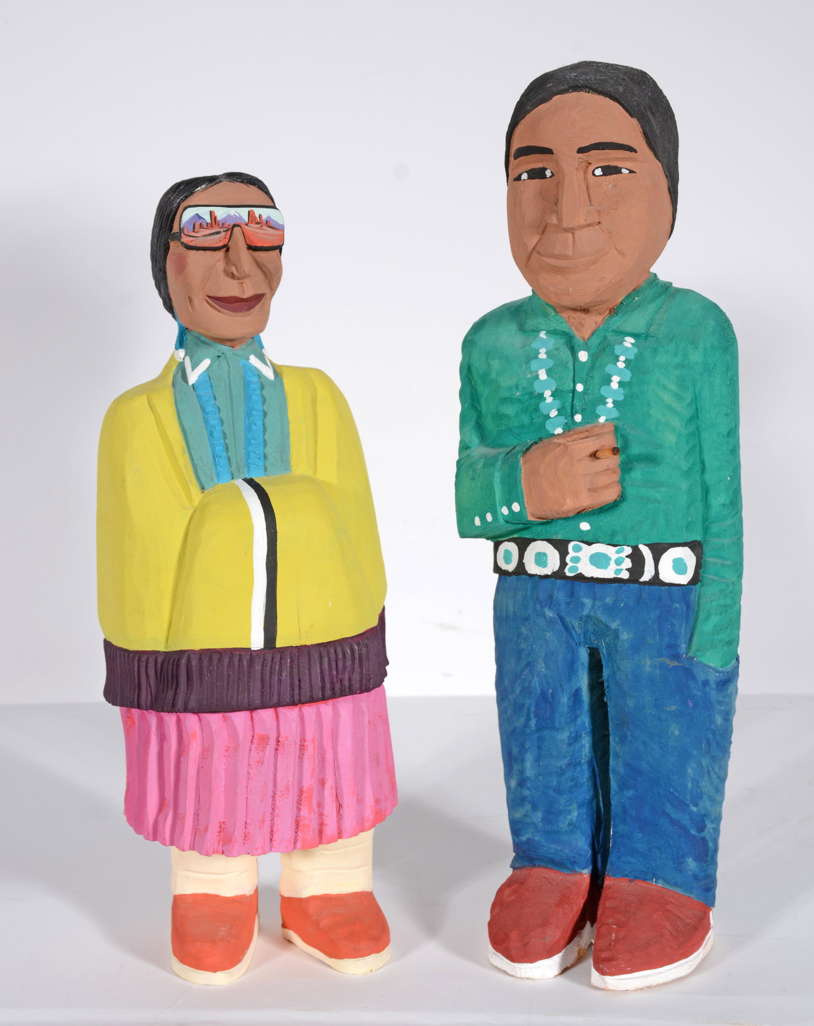 Rena Juan. Navajo Couple.: Rena Juan. Navajo Couple. 1995. Signed and dated. Carved and painted wood. Excellent condition. Average size is 15"h. Est. $300-500. Ship: $45