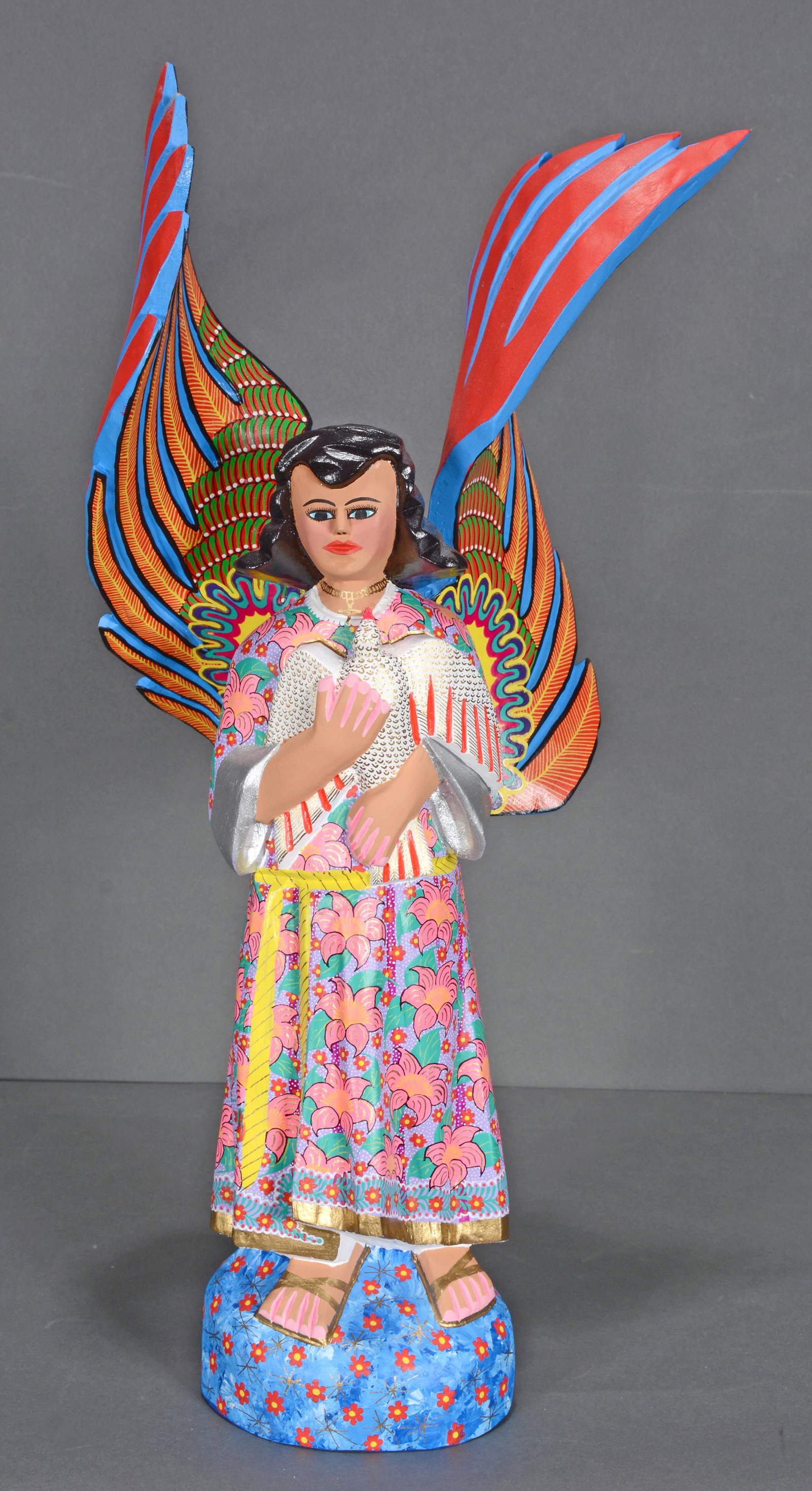 Alberto & Maria Jimenez. Angel With Dove.: Alberto and Maria Jimenez. Angel With Dove. #10. Signed and titled. Carved and painted wood. Excellent condition. 19" x 10". Provenance: Barbara & Robert Hunter Collection. Est. $300-500. Ship: $85