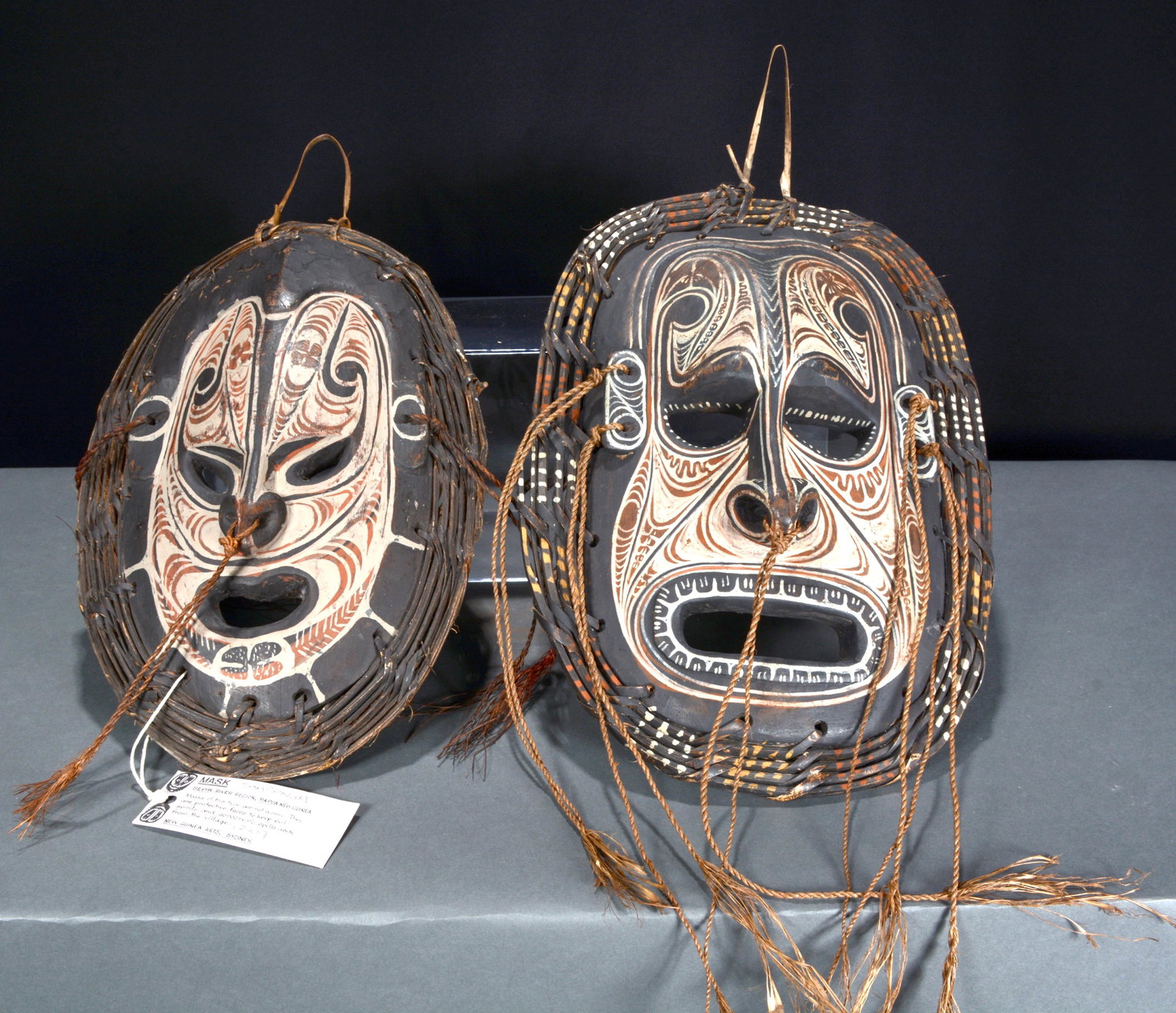 Papua New Guinea. Pair of Protective Masks.: Papua New Guinea. Pair of Protective Masks. Protective Masks to keep evil away from the village. Not made to be worn. Carved and painted wood with natural fibers. Minor surface wear, otherwise great c