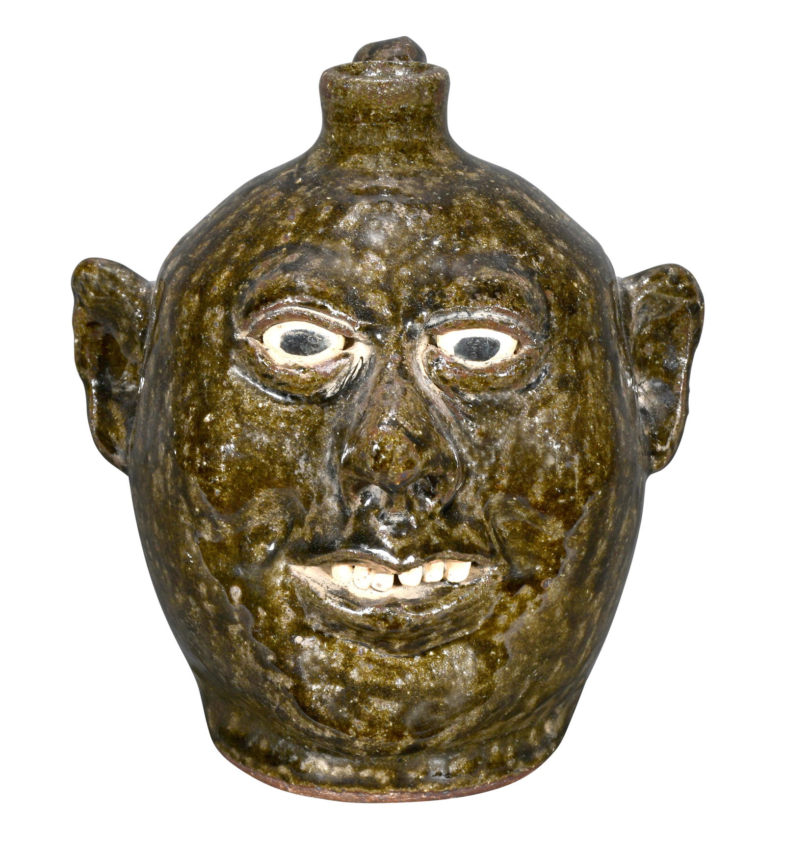 Lanier Meaders. Small Face Jug.: Lanier Meaders. Small Face Jug. c. late 1970s Excellent tobacco-spit glaze. One tooth separated from clay during the kiln firing, otherwise excellent condition. 8"h. Est. $800-1,200. Ship: $45