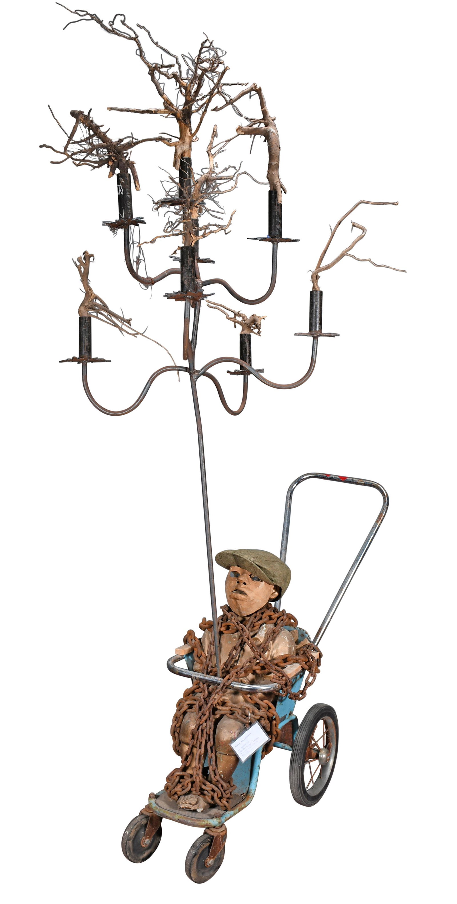 Norbert Kox. Bondage.: Norbert Kox. Bondage. Not Signed. Cement sculpture with metal chains, baby stroller and other mixed media. Great environmental condition. 26" x 43" x 85"h. Est. $1,000-2,000. Buyer is responsible for 