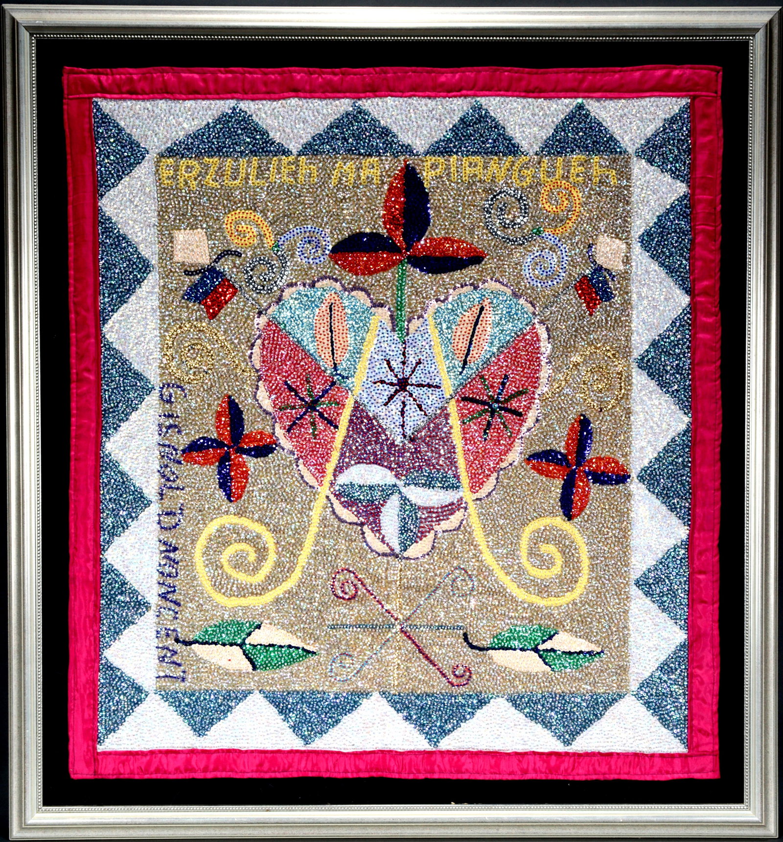 Gisnol Dnoncent. Erzulieh Ma Piangue.: Gisnol Dnoncent. Erzulieh Ma Piangue. Signed and titled. Heavily beaded and sequined backed to rayon. Excellent condition. Image is 30" w x 33" h. Frame is 36" w x 38" h. Est. $500-800. Ship: $125