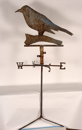 Roof Top Bird Weathervane.: c. 20th century. Found in Massachusetts. Heavy rusted pitted sheet metal with directional signs. Comes with roof mount. Great condition. 30" w x 63"h. Provenance: The George and Sue Viener Collection 
