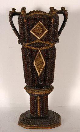 Tramp Art Trophy.: Carved and stained wood with felt and metal tacks. Very minor chips, otherwise excellent condition. Rare example. Found in New Hampshire. 16"h. Provenance: The George and Sue Viener Collection. Est. $