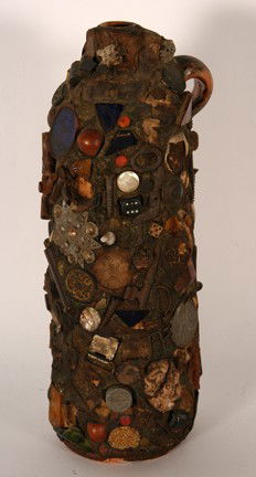 Antique Memory Jug.: English bottle with Victorian mixed media applied to gumbo clay. Some minor loss of items, otherwise great condition. 12"h. Est. $100-150. Ship: $40