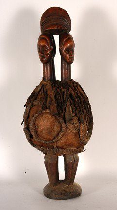 Powerful Suku Tribe Fetish.: Suku tribe, Zaire. 28" x 11" x 11". Good condition. Carved wood, leather, rope. Est. $100-200. Ship: $55. Powerful Suku tribe fetish - Four standing fetish figures with bend 4 sets of legs supporting 