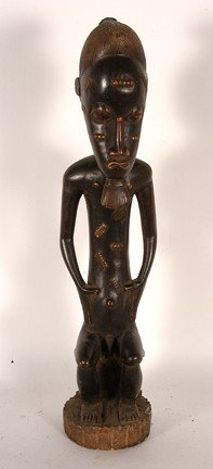 Baule Seated Male Figure W Beard.: Large decorative hardwood carving in the baule stle, the bearded male figure sits upon a low stool with hands at sides, low relief body scarification and intricate hairdo. Baule tribe, West Africa, Iv