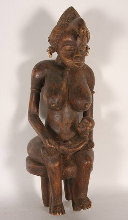 Lobi Tribe Iron Figure.: Carved wood, shells, fabric. Chipped toes, otherwise good condition. 25" x 7" x 7". Est. $100-200. Ship: $65.