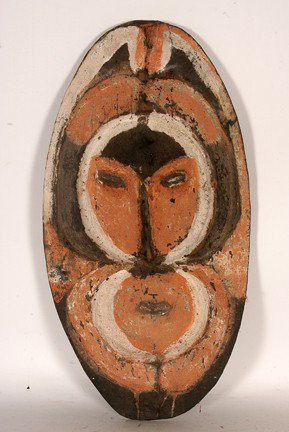 PNG Tribe New Guinea Shield.: Wood & local pigments. Good condition. 22" x 11.5" x 2". Est. $100-200. Ship: $45.