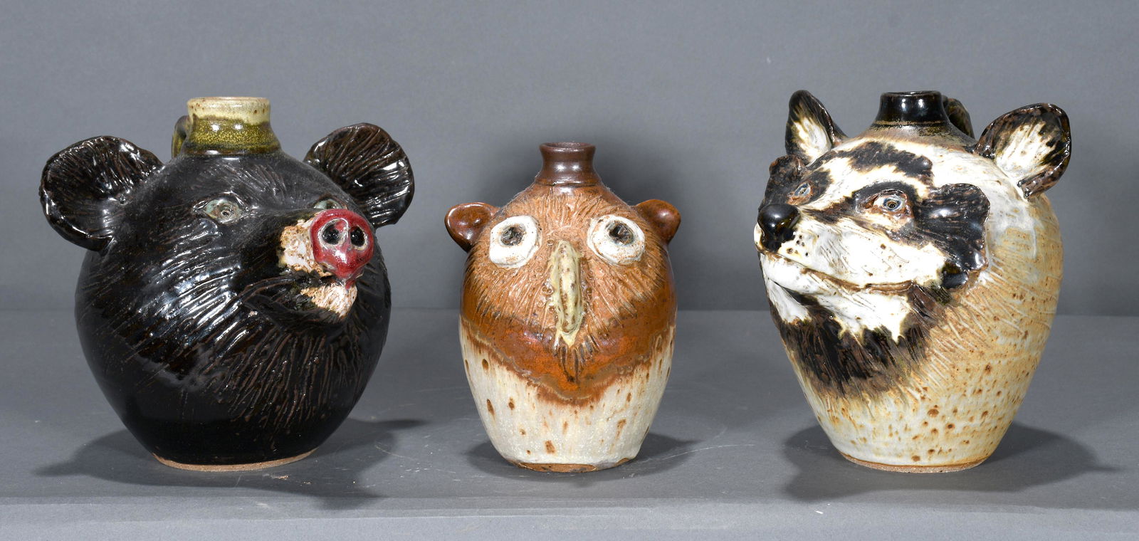 Patrick Taylor. Bear, Owl & Raccoon Face Jugs. (1 of 4)