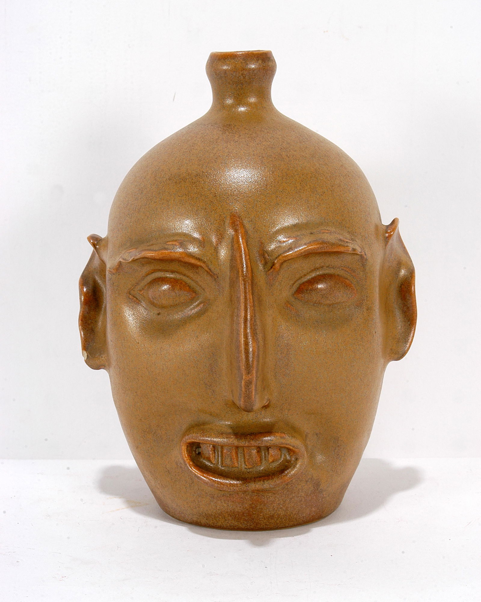 D.X. Gordy. Mustard Yellow Face Jug. (1 of 6)