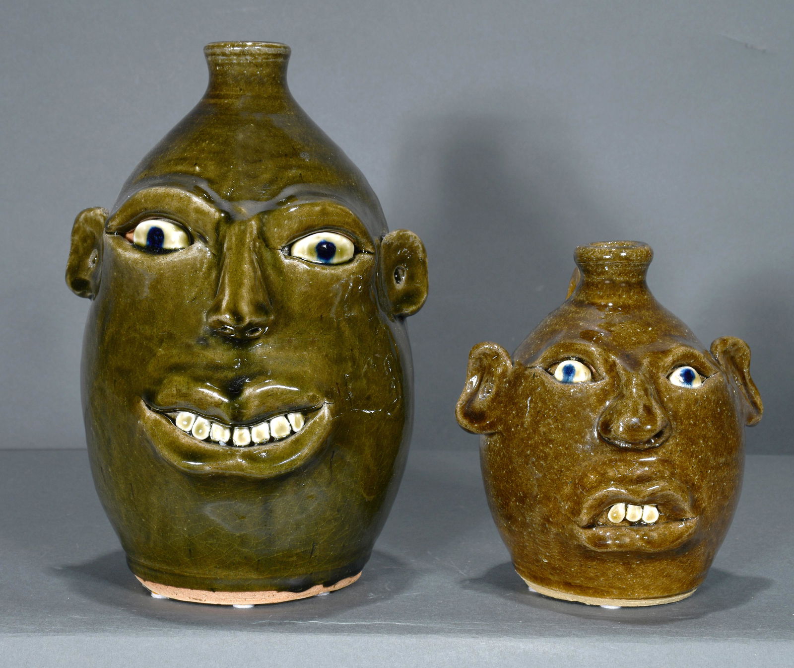 Anita Meaders. Large and Small Face Jugs. (1 of 4)