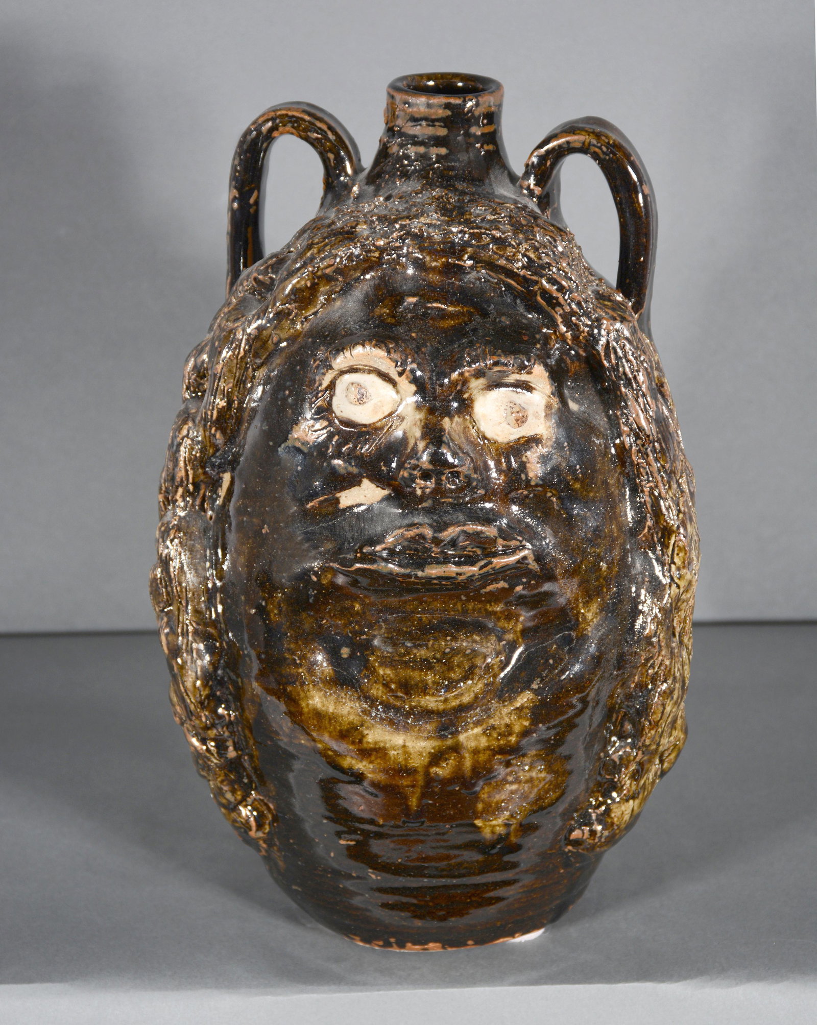 Marie Rogers. Female Face Jug With Grapes on Verso.: Marie Rogers. Female Face Jug With Grapes on Verso. Signed. Mint condition. 12"h. Est. $200-300. Ship: $45