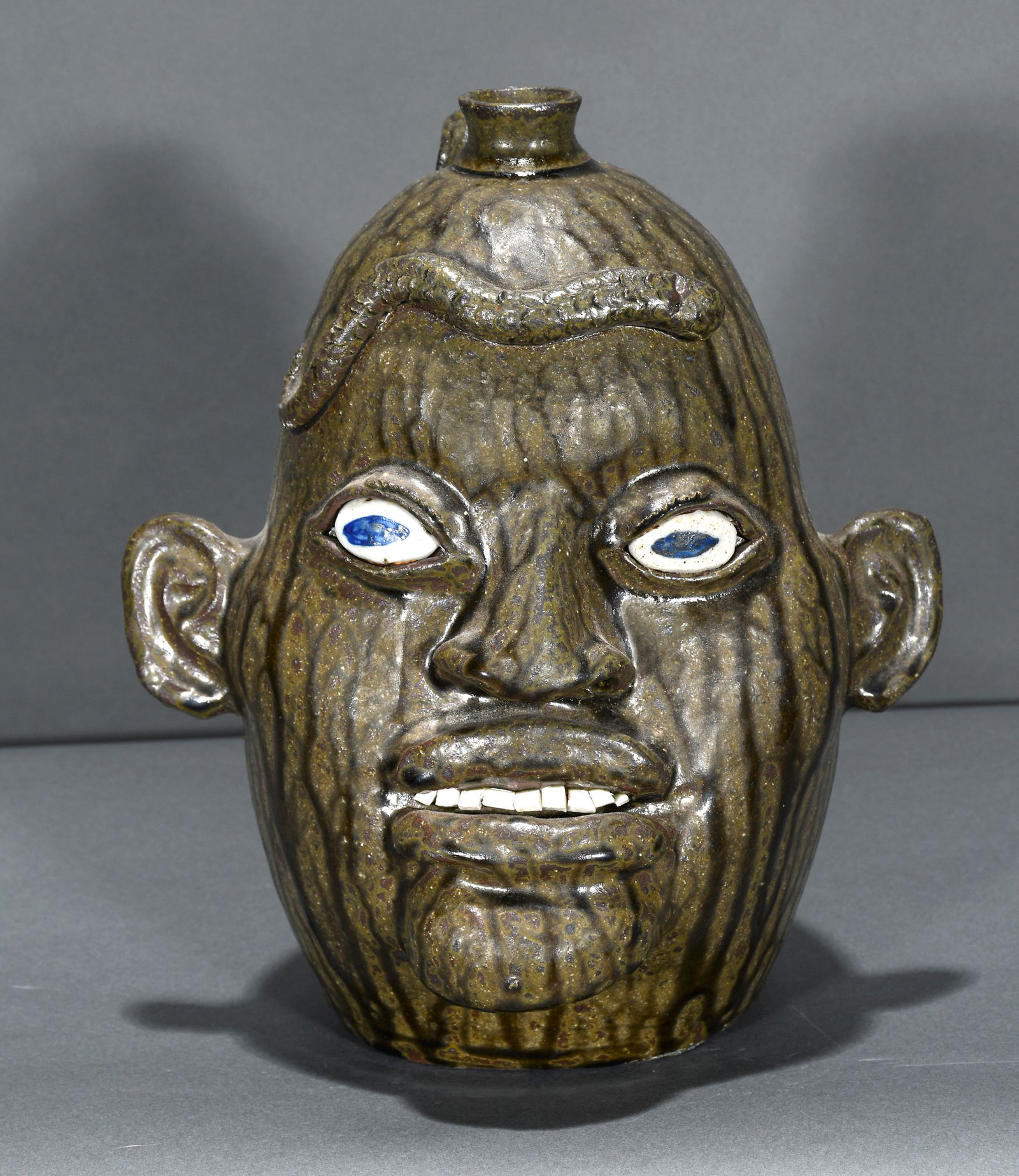 Matthew Hewell. Large Face Jug with Snake. (1 of 3)