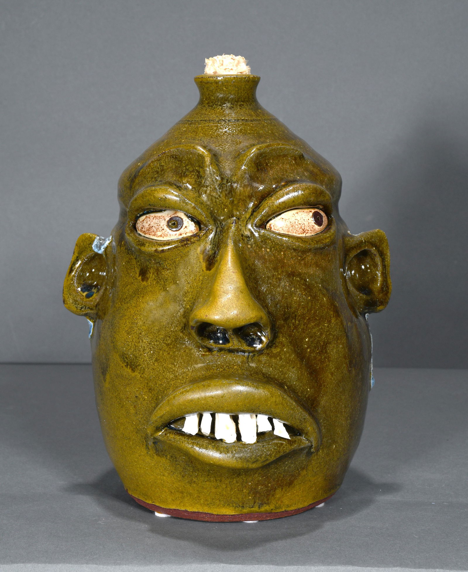Wayne Hewell. Face Jug with Glass Drips. (1 of 4)