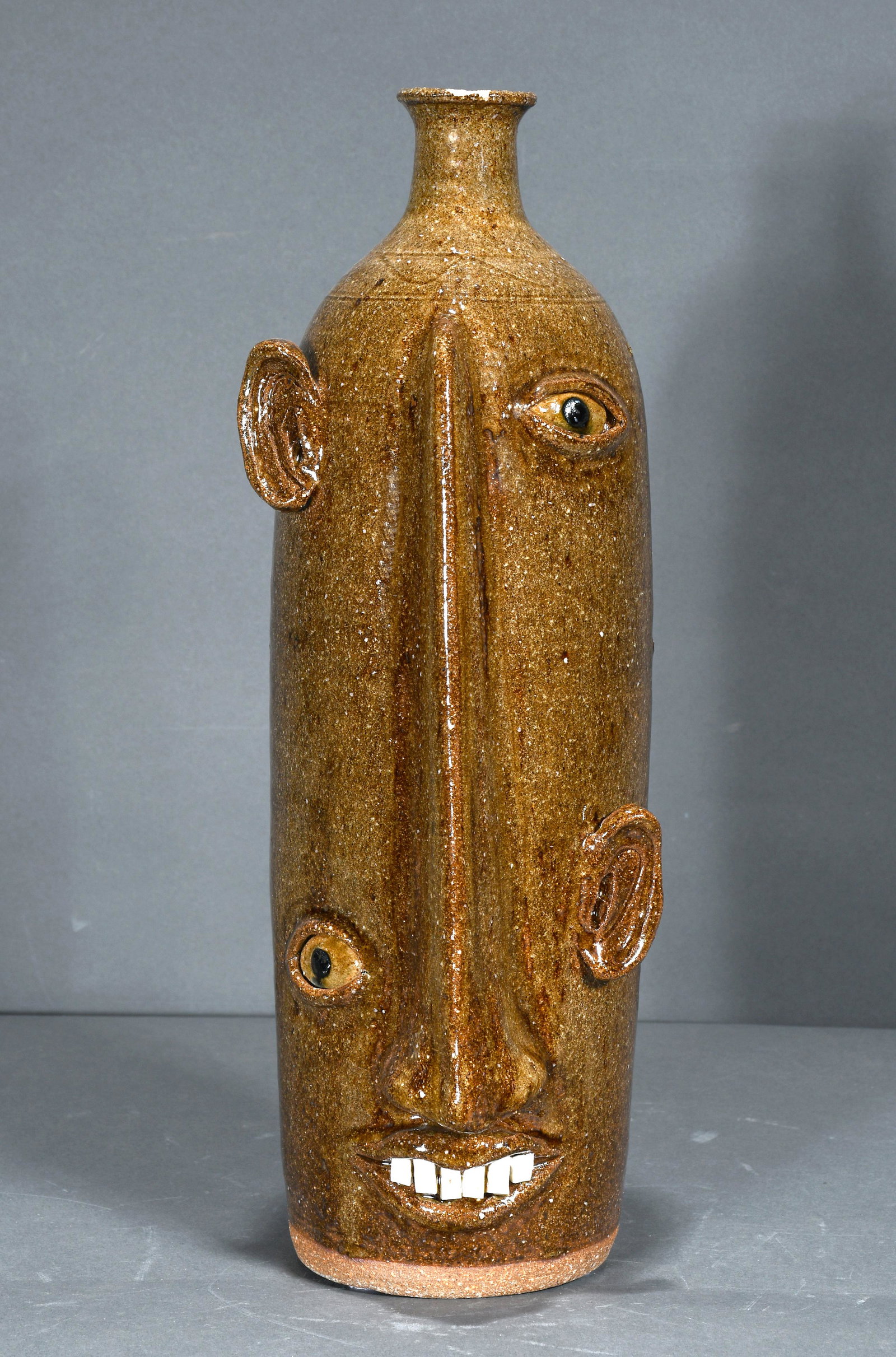 Don Craig. Picasso-Style Face Jug.: Don Craig. Picasso-Style Face Jug. Signed. Chip on rim, otherwise excellent condition. 14" h. Est. $200-300. Ship: $65