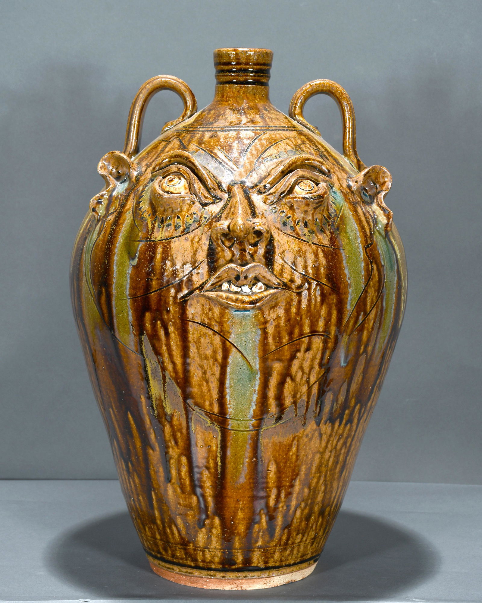 Kim Ellington. 5 Gallon Drippy Glaze Face Jug. (1 of 6)