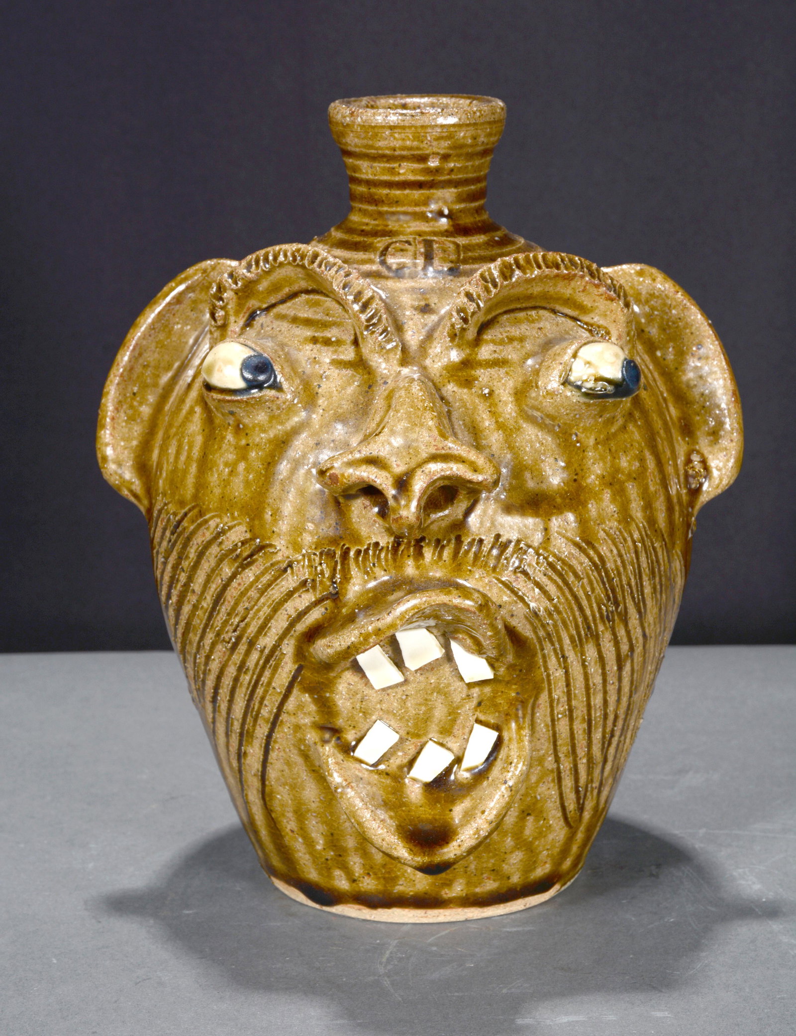 Charles Lisk. Half Gallon Screaming Face Jug.: Charles Lisk. Half Gallon Screaming Face Jug. Stamped on top and bottom. Mint condition. 8.5" h. Est. $100-200. Ship: $45