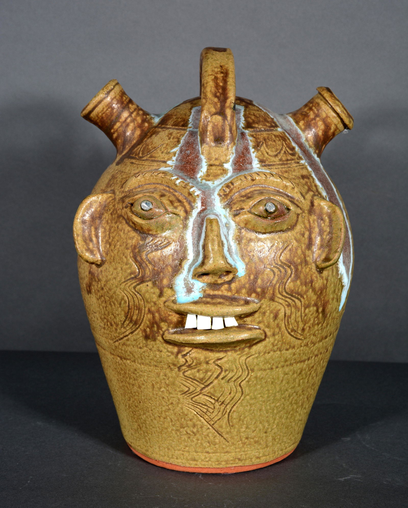 Walter Fleming. Dbl Spout Face Jug With Glass Runs. (1 of 3)