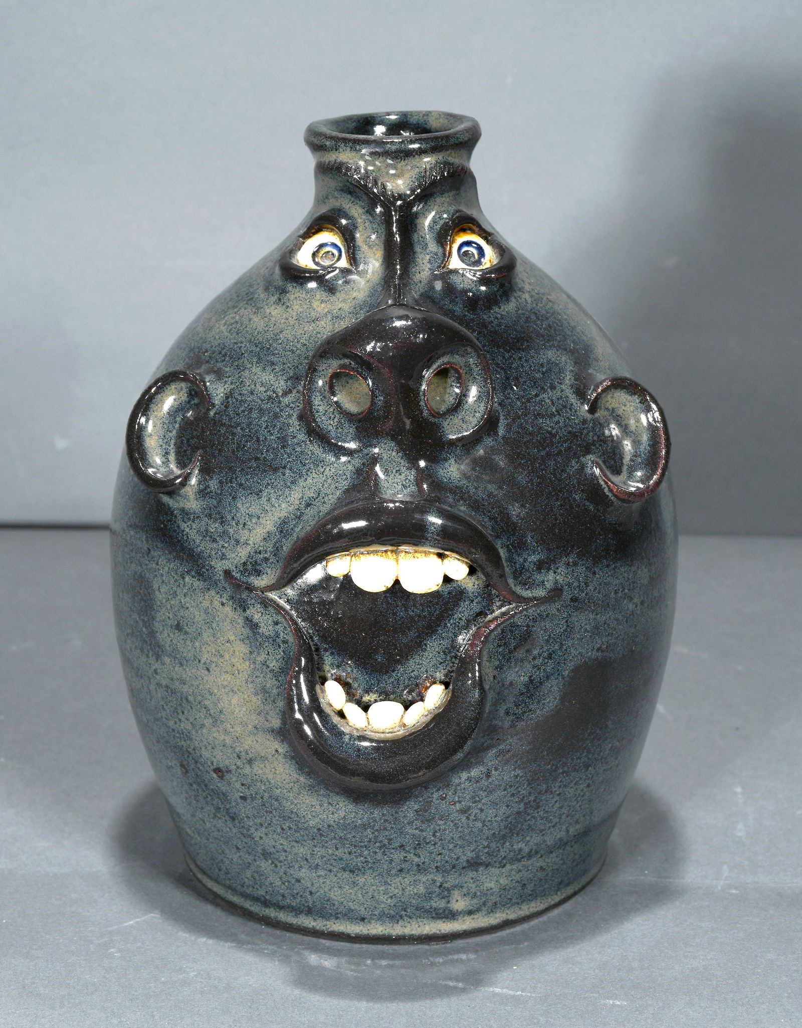 Roger Corn. Pug Nose Face Jug. (1 of 3)